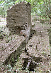 Brick pillar that supported a beam pump with the foundations of a horiozntal engine beside it, Muxton Bridge Colliery. (Kelvin Lake)