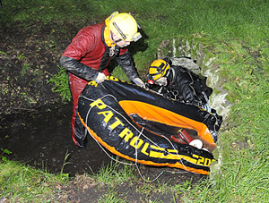 Recovering the slightly deflated dingy from the tunnel.